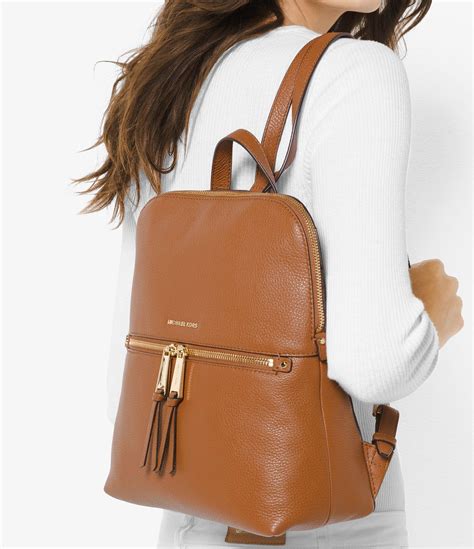 michael kors rhea medium slim backpack brown|Michael Kors signature backpack.